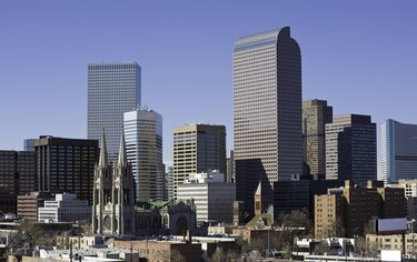 Downtown Denver, Colorado, skyline showing cathedral and office skyscraper.