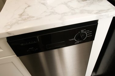 New whirlpool hot sale dishwasher smells