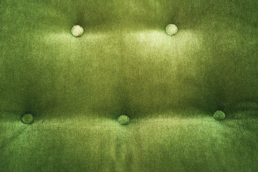 Detail of green velvet chair