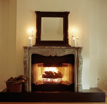 Fireplace with candles on mantle