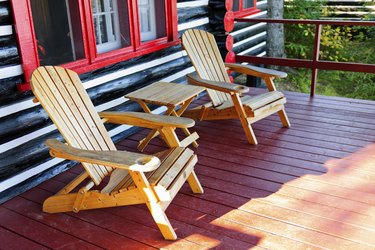 Log cabin porch with chairs
