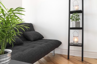 Living room decorated with plants and lanterns