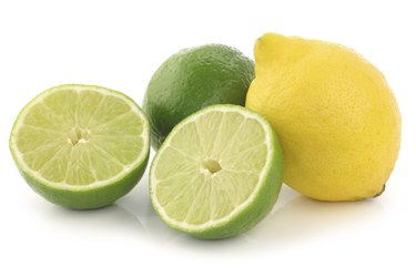 colorful fresh lime ,lemon fruit and a cut one