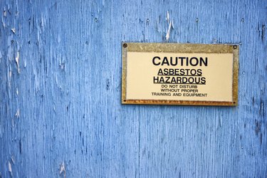 Caution sign warning of asbestos hazard
