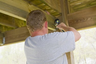 Carpenter securing deck