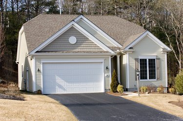 Exterior of garage with house