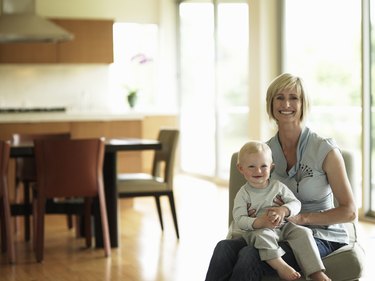 Portrait of mother holding son