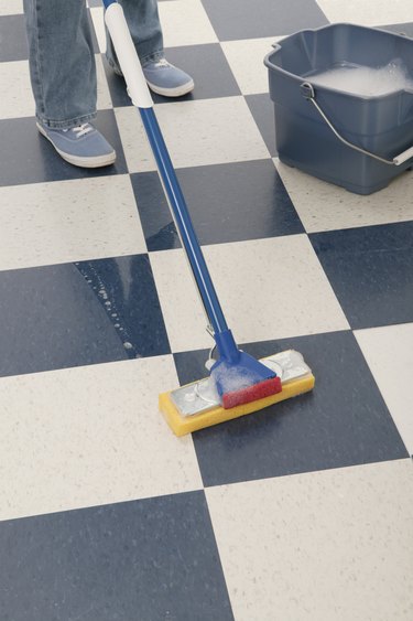 Woman mopping floor