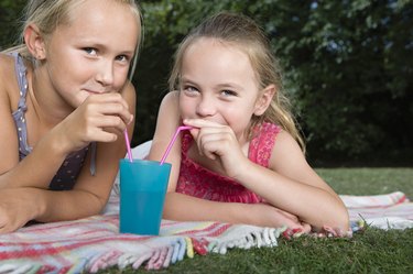 Girls sharing a drink