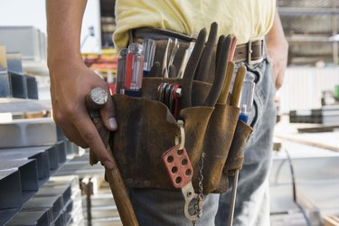 Tool belt on construction worker