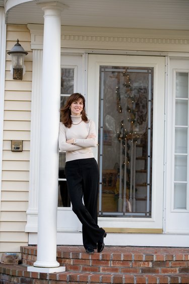 Woman standing on porch