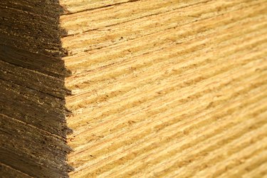 Close-up of stack of sheets of particleboard