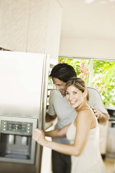 Couple by refrigerator