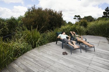 Couple relaxing on deck