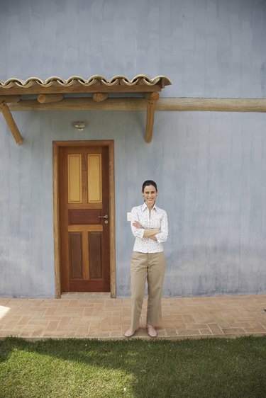 Mature woman on patio, portrait