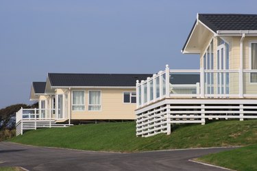 Three static holiday homes or caravans