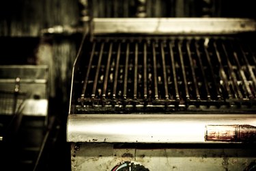Greasy grill in commercial kitchen