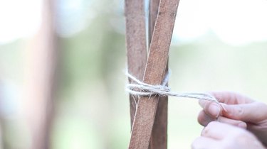 Tying wood stakes together