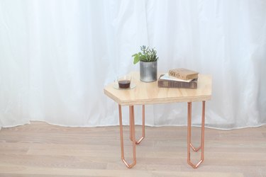 Geometric coffee table with copper legs
