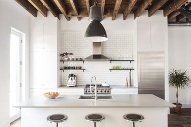 farmhouse kitchen with exposed wood ceiling beams