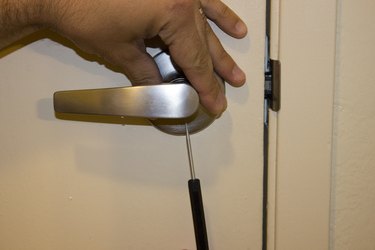 How to Remove a Lever Door Handle Without Screws | Hunker