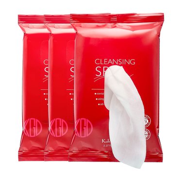 Three red plastic packs with a white cloth extending from the topmost pack.