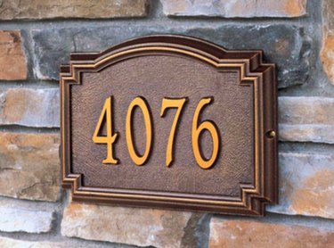 House numbers on brick.