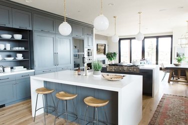 Two large islands stand in an open kitchen.