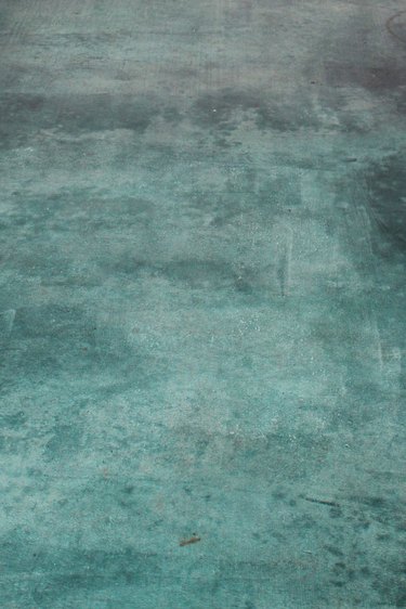 A green concrete floor.
