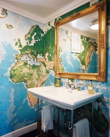 bathroom with world map wallpaper