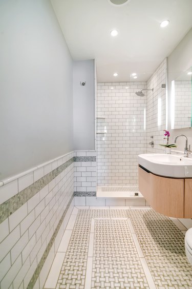 Photo of bathroom with small walk-in shower.