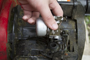 Lawn Mower Gas Is Pouring Out Of Carburetor  