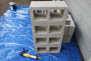 The base of the cinder block supports.