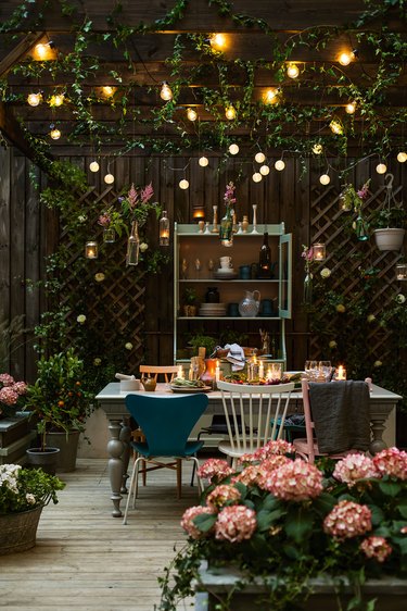 outdoor dining area with fairy lights