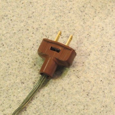 Lamp cord with new plug attached.