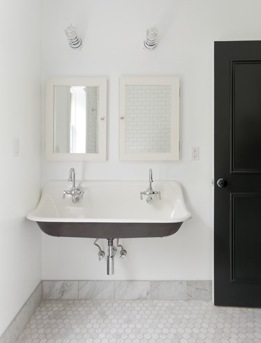 white bathroom marble tile baseboards