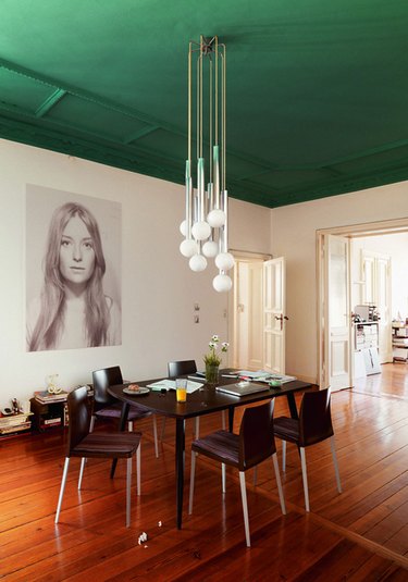 Dining room featuring forrest green ceiling