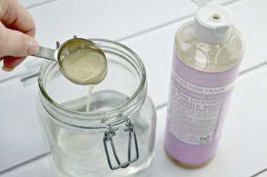 Add castile soap to your container.