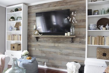 Completed pallet accent wall with TV mounted