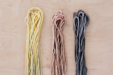Dyed yarn strands drying