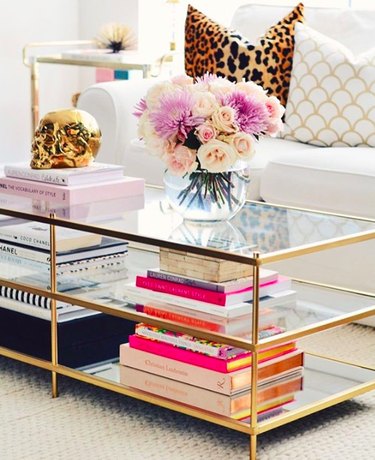 glass coffee table with books