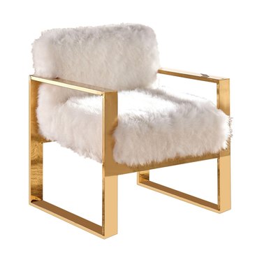 White faux fur accent chair with gold details