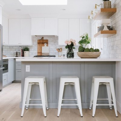 kitchen with gray cabinets and light wood floors