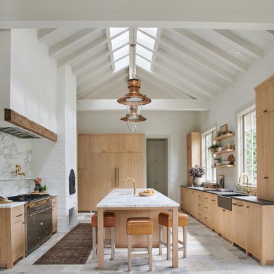 country farmhouse kitchen with natural stone flooring