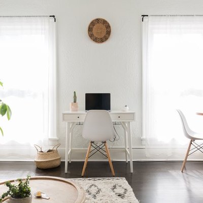 living room space with desk and dining area