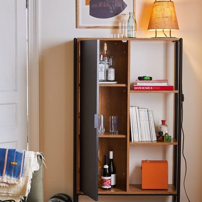 black and brown storage unit in room