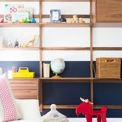 midcentury playroom storage idea with wall-mounted storage unit
