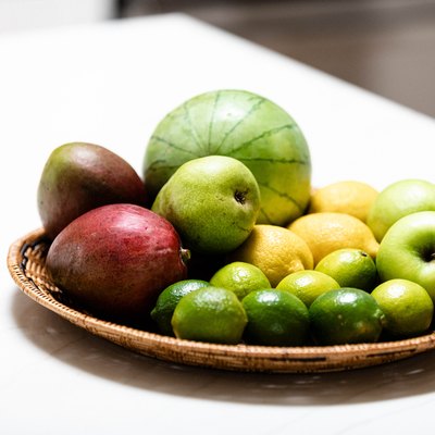 Produce in basket on kitchen counter