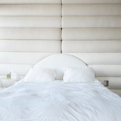 White pillows and sheets on bed