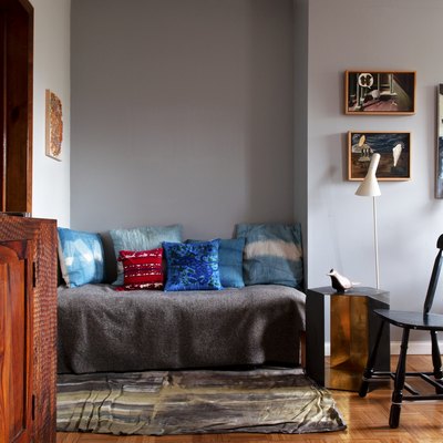 hardwood floor in living room with couch and rug